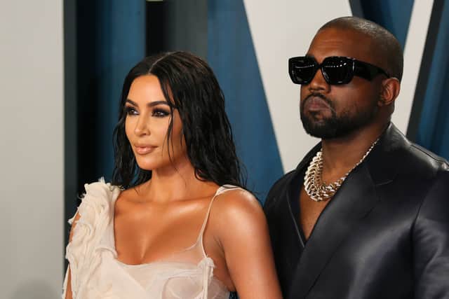 Kanye West has been accused of showing explicit photos of his ex-wife Kim Kardashian to Adidas staff.