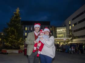 One-year-old Hector Tully with his parents Marie Clare and Angus Tully.  Hector was given just one day to live when born premature, has turned on the Christmas lights at the Royal Hospital for Children and Young People, Edinburgh, where he spent 259 nights of his life, undergoing 15 operations.