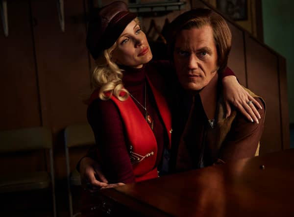 Jessica Chastain as Tammy Wynette and Michael Shannon as George Jones, sat together at a piano in George and Tammy (Credit: Dana Hawley/Paramount+)