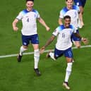 England striker Marcus Rashford celebrates with team mates after scoring against Wales. (Getty Images)