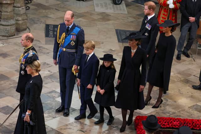 Prince William, Prince of Wales, Catherine, Princess of Wales, Prince Harry, Duke of Sussex, Meghan, Duchess of Sussex, Prince George of Wales and Princess Charlotte of Wales at Westminster Abbey after the State Funeral of Queen Elizabeth II on September 19, 2022 in London, England. Elizabeth Alexandra Mary Windsor was born in Bruton Street, Mayfair, London on 21 April 1926. (Photo by Phil Noble - WPA Pool/Getty Images)