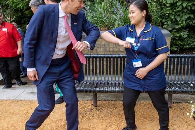 Not quite dancing, but close enough - Matt meets staff at Chelsea & Westminster hospital in June 2021