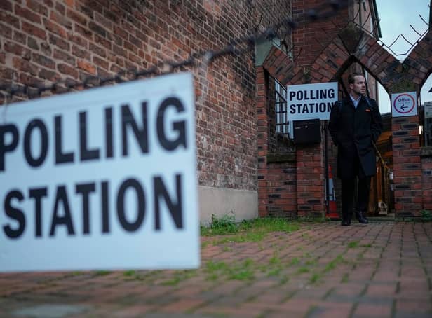 CHESTER, ENGLAND - DECEMBER 01: A member of the public leaves  the Festival Church polling station after voting in the Chester by-election on December 01, 2022 in Chester, England. The Commons seat was vacated when Labour MP Chris Matheson resigned following allegations he had breached the sexual misconduct policy of the House of Commons. (Photo by Christopher Furlong/Getty Images)