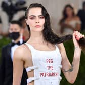 English model Cara Delevingne arrives for the 2021 Met Gala at the Metropolitan Museum of Art on September 13, 2021 in New York (Photo by ANGELA WEISS/AFP via Getty Images)