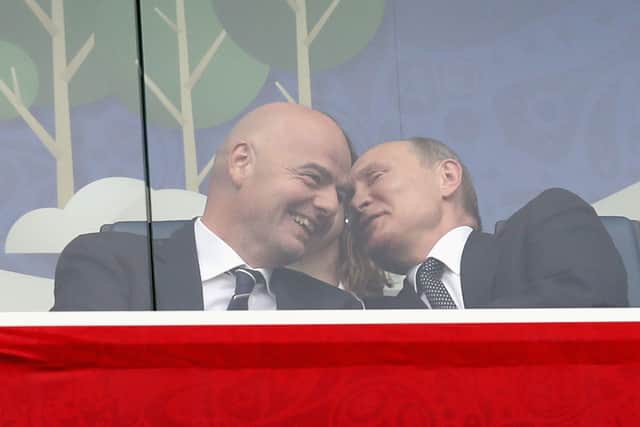Gianni Infantino (L) with Russian president Vladimir Putin in 2017