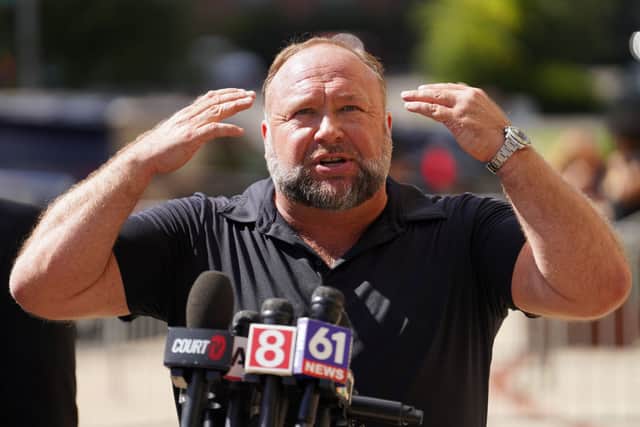 InfoWars founder Alex Jones speaks to the media outside Waterbury Superior Court during his trial on September 21, 2022 in Waterbury, Connecticut (Photo by Joe Buglewicz/Getty Images)