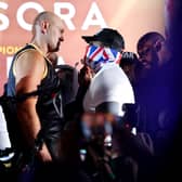LONDON, ENGLAND - DECEMBER 02: Tyson Fury (L) and Derek Chisora face off during the Tyson Fury v Derek Chisora: Weigh-In at Business Design Centre on December 02, 2022 in London, England. (Photo by Andrew Redington/Getty Images)