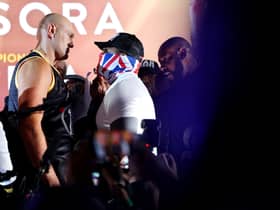 LONDON, ENGLAND - DECEMBER 02: Tyson Fury (L) and Derek Chisora face off during the Tyson Fury v Derek Chisora: Weigh-In at Business Design Centre on December 02, 2022 in London, England. (Photo by Andrew Redington/Getty Images)
