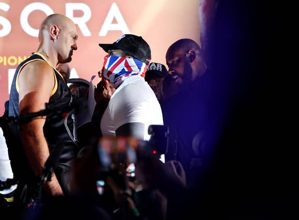 <p>LONDON, ENGLAND - DECEMBER 02: Tyson Fury (L) and Derek Chisora face off during the Tyson Fury v Derek Chisora: Weigh-In at Business Design Centre on December 02, 2022 in London, England. (Photo by Andrew Redington/Getty Images)</p>