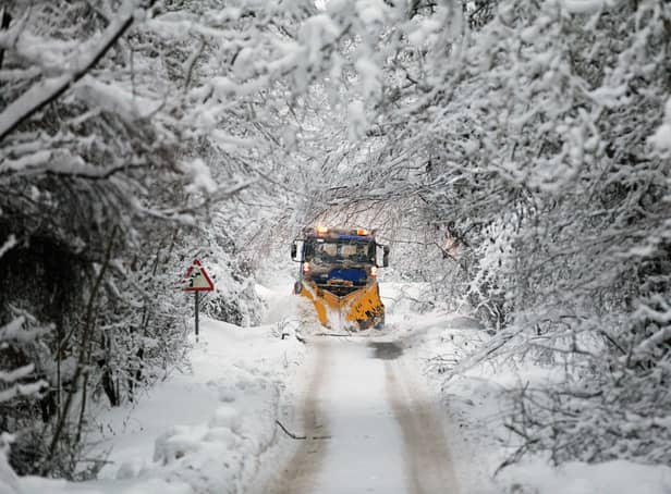 <p>PERTH, SCOTLAND - DECEMBER 03: Tayside Contracts plough driver Iain Beedie clears rural roads in Perthshire on December 3, 2010 in Perth, Scotland. After heavy snowfall across the country resulting in severe disruption to Britain's infrastructure the country is now gripped by freezing temperatures. (Photo by Jeff J Mitchell/Getty Images)</p>