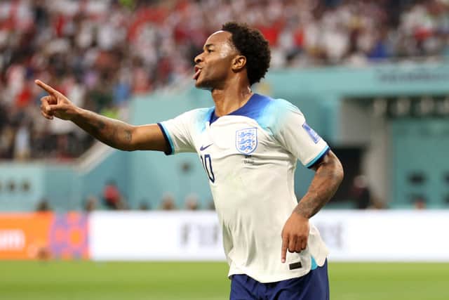 Raheem Sterling of England celebrates after scoring their team’s third goal during the FIFA World Cup Qatar 2022 Group B match between England and IR Iran at Khalifa International Stadium on November 21, 2022 in Doha, Qatar. (Photo by Julian Finney/Getty Images)