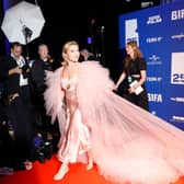 Florence Pugh ensured that all photographers were taking photos of her in her stunning slip dress.  (Photo by Tristan Fewings/Getty Images)