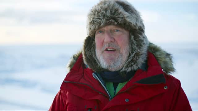 Stephen Fry, filming on location in Iceland for A Year on Planet Earth (Credit: ITVX/Plimsoll Productions)