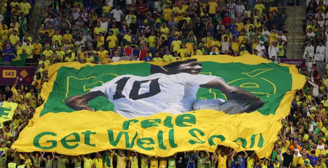 Brazil fans hold a banner showing support for former Brazil player Pele. (Photo by Michael Steele/Getty Images)