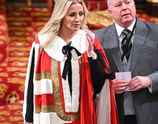Baroness Michelle Mone (L) takes her seat in House of Lords to listen to the Queen's Speech during the State Opening of Parliament in the Houses of Parliament in London on October 14, 2019. (Photo by Paul Edwards / POOL / AFP) (Photo by PAUL EDWARDS/POOL/AFP via Getty Images)