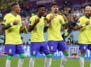 Vinicius Jr celebrates with Raphinha, Paqueta and Neymar after scoring Brazil’s first goal