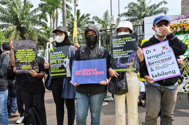 Protesters in Jakarta campaign against the new criminal code which will outlaw sex before marriage and unmarried couples cohabiting. (Credit: Getty Images)