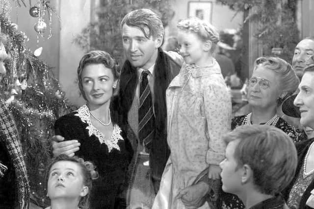 James Stewart, centre, and Donna Reed in "It's A Wonderful Life." (RKO Radio Pictures)