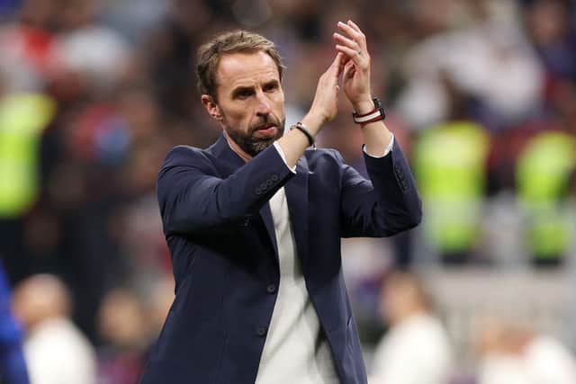 Gareth Southgate, Head Coach of England, applauds fans after the 1-2 loss during the FIFA World Cup Qatar 2022 quarter final match between England and France at Al Bayt Stadium on December 10, 2022 in Al Khor, Qatar. (Photo by Richard Heathcote/Getty Images)