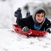 Children enjoy a day off school with some sledging in February 2019 (Photo: Finnbarr Webster/Getty Images)