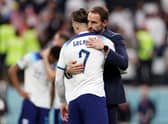Jack Grealish and Gareth Southgate, Head Coach of England, look dejected after their sides' elimination from the tournament during the FIFA World Cup Qatar 2022 quarter final match between England and France at Al Bayt Stadium on December 10, 2022 in Al Khor, Qatar. (Photo by Elsa/Getty Images)