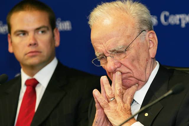 Rupert Murdoch and son Lachlan. (Photo by WILLIAM WEST/AFP via Getty Images)