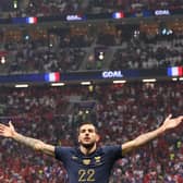 Theo Hernandez celebrates scoring France’s’s first goal during the World Cup semi-final meeting with Morocco  (Photo by ADRIAN DENNIS/AFP via Getty Images)