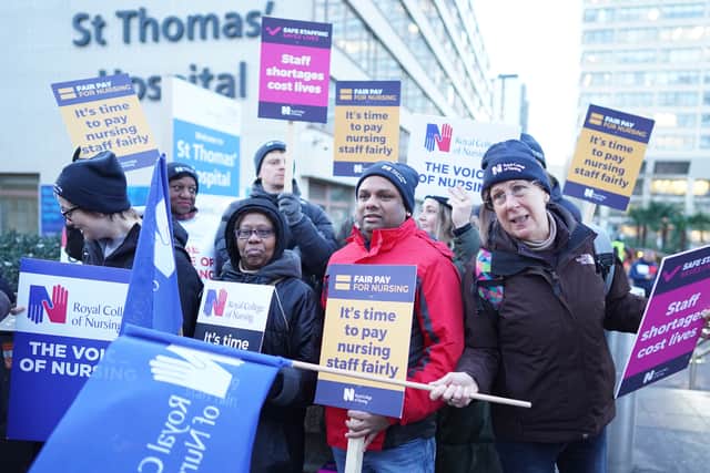 Thousands of NHS nurses are striking to demand better pay (Photo: PA)
