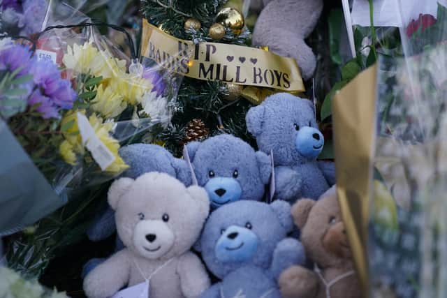 Flowers and tributes near to Babbs Mill Park in Kingshurst (Photo: PA)