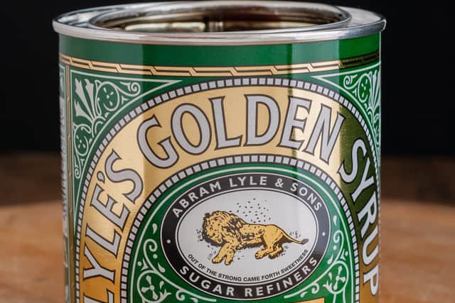 Lyle’s Golden Syrup invented by Abram Lyle with its distinctive green and gold metal tin (Photo: Adobe Stock)