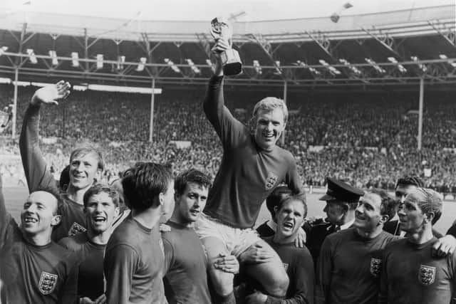 England captain Bobby Moore  holds up the Jules Rimet trophy. (Getty Images)