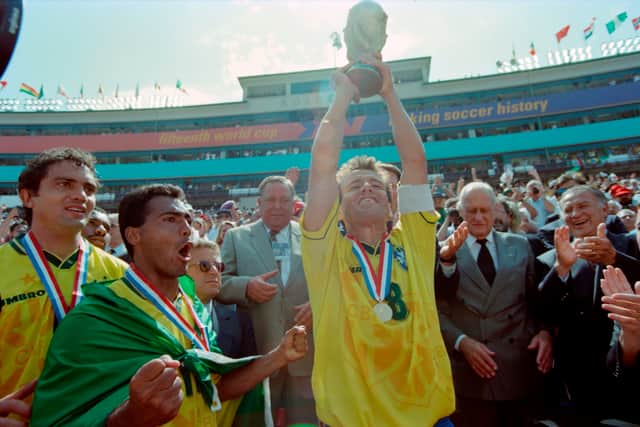 Brazilian captain Dunga holds aloft the FIFA World Cup trophy. (Getty Images)