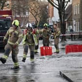 Emergency services on Belsize Road in Camden after a burst water main flooded the London street. London Fire Brigade (LFB) said eight fire engines and around 60 firefighters were called to Belsize Road at 2.50am on Saturday morning after a 42-inch water main burst, causing flooding to a depth of half a metre across an area of around 800 metres. Picture date: Saturday December 17, 2022.