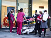 Nurses break picket line to help injured man