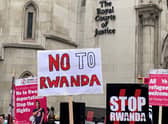 Demonstrators outside the Royal Courts of Justice, central London, protesting against the government’s plan to send some asylum seekers to Rwanda. Credit: PA