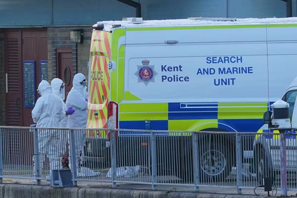 Police Forensic officers pictured at the RNLI station at the Port of Dover after a large search and rescue operation launched after the boat capsized in the Channel.