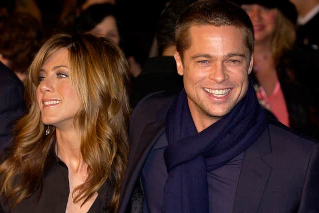 Actress Jennifer Aniston and actor Brad Pitt attend the Los Angeles premiere of Universal Pictures' film "Along Came Polly" on January 12, 2004 at the Grauman's Chinese Theatre, in Hollywood, California. (Photo by Vince Bucci/Getty Images)