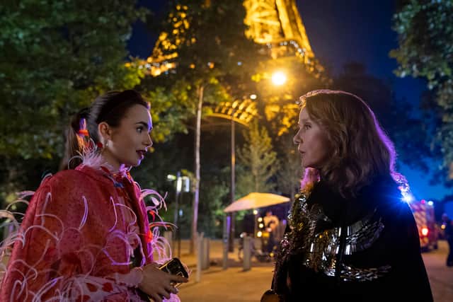 Emily in Paris. (L to R) Lily Collins as Emily, Philippine Leroy-Beaulieu as Sylvie Grateau  (Photo: Netflix)