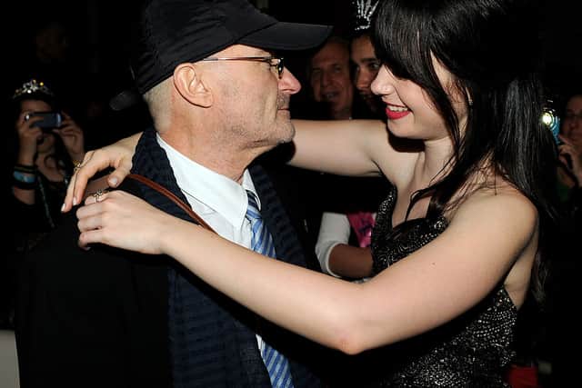 Lily Collins with her dad Phil Collins. (Photo by Kevin Winter/Getty Images)