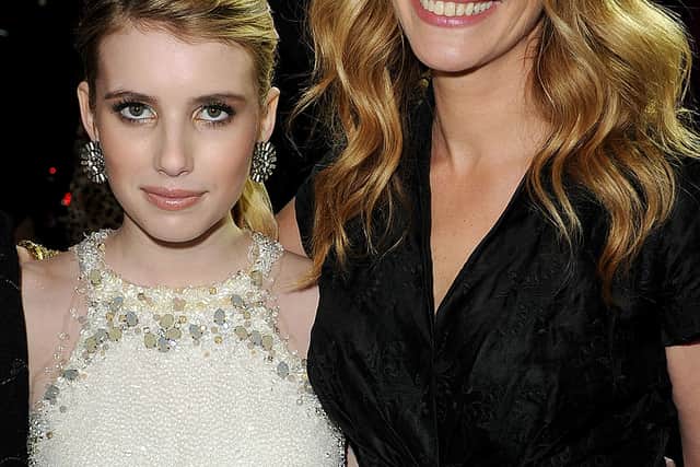 Emma Roberts (L) and Julia Roberts arrive at the premiere of New Line Cinema’s “Valentine’s Day” held at Grauman’s Chinese Theatre on February 8, 2010 in Los Angeles, California.  (Photo by Kevin Winter/Getty Images)