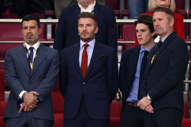 David Beckham in the stadium stands in Qatar, alongside Luis Figo and Robbie Keane, prior to the match between Croatia and Morocco. Credit: Getty Images