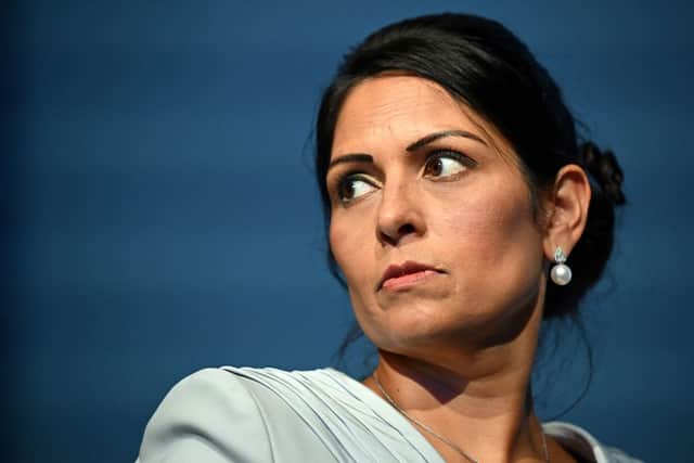 Former Home Secretary Priti Patel has come under fire for her reported Christmas card depicting herself as a fairy magicking up deportations to Rwanda. (Photo by PAUL ELLIS/AFP via Getty Images)