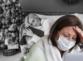 Health chiefs say anyone with Covid or flu symptoms should stay at home this Christmas (Composite: Kim Mogg)
