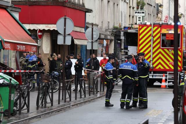 French security personnel secure the street after several shots were fired along rue d’Enghien in the 10th arrondissement, in Paris. Credit: THOMAS SAMSON/AFP via Getty Images
