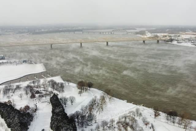 The Ohio River is seen in Louisville, Kentucky, under freezing temperatures. Credit: LEANDRO LOZADA/AFP via Getty Images