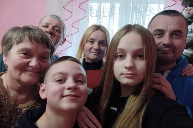 Olha Komarnytska’s family of (back row from left to right) Vasyl, Olha and Taras (front row left to right) Anna, Volodymyr and Mia. Olha, who lives in Birmingham, and her children, Mia, 15, and Volodymyr, 13, are set to experience their first Christmas in the UK. Credit: PA