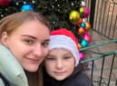 Kateryna Chebizhak with her son Kolya. Despite usually celebrating Christmas on January 7, as determined by the Orthodox Church, Ms Chebizhak, 34, who works as a telephone interpreter, and her seven-year-old son Kolya, are planning on spending December 25 with friends who live near them in Enfield, North London. Credit: PA