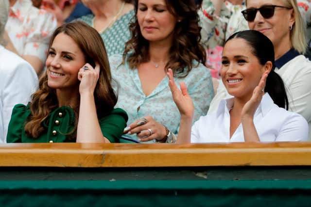 Meghan and Kate watching Serena play Romania's Simona Halep during their women's singles final on day twelve of the 2019 Wimbledon. (Photo by BEN CURTIS/AFP via Getty Images)