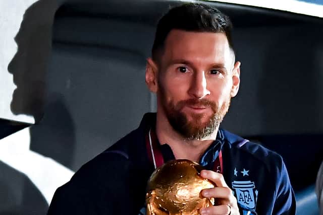 Lionel Messi holds the FIFA World Cup  (Getty Images)