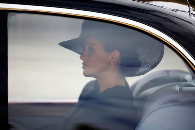 Meghan, Duchess of Sussex, Duchess of Sussex, sits in a car on her way to the State Funeral Service for Britain's Queen Elizabeth II, at Westminster Abbey in London on September 19, 2022. (Photo by SARAH MEYSSONNIER / POOL / AFP) (Photo by SARAH MEYSSONNIER/POOL/AFP via Getty Images)